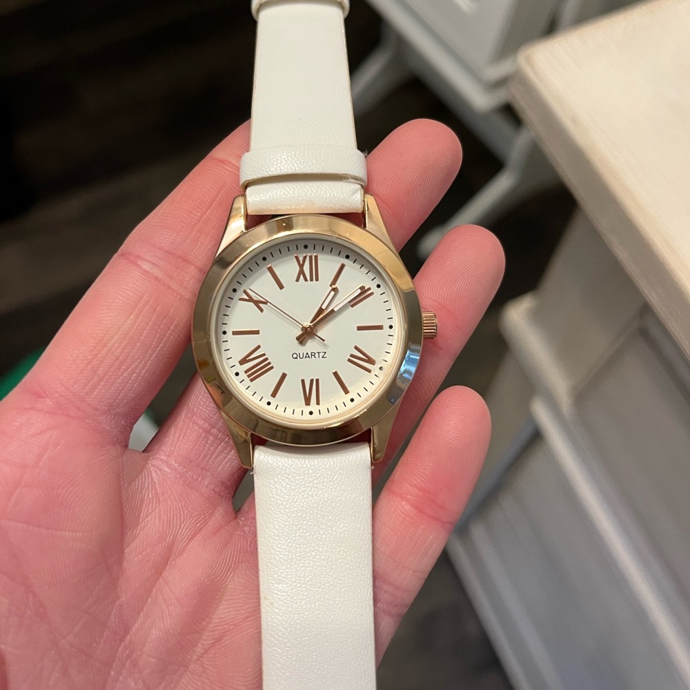 White faux leather and rose gold wrist watch